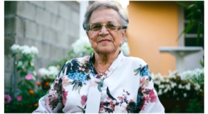 Older lady in a flowery blouse